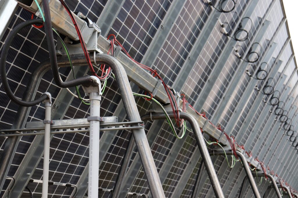 The backside of a solar panel, including PV wire, racking and other components. Photo by Sun-Pull Wire.